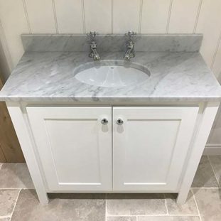 White Vanity Unit With Single Undercounter Sink. Carrara Top & Splashback