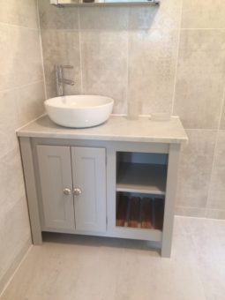 Bespoke vanity unit in pavillion grey , carrara top and solid oak slats
